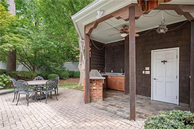 1006 Arbor Trce NE, Atlanta, GA 30319 - view of patio featuring an outdoor kitchen, a ceiling fan, and outdoor dining area