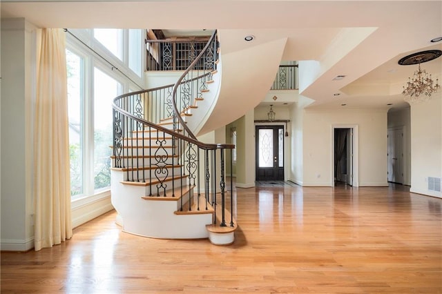 1006 Arbor Trce NE, Atlanta, GA 30319 - entrance foyer featuring wood finished floors, crown molding, stairs, and recessed lighting