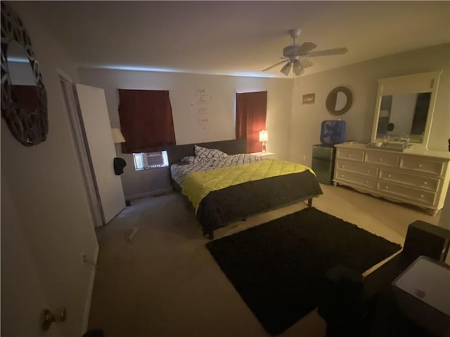 bedroom featuring carpet flooring and a ceiling fan