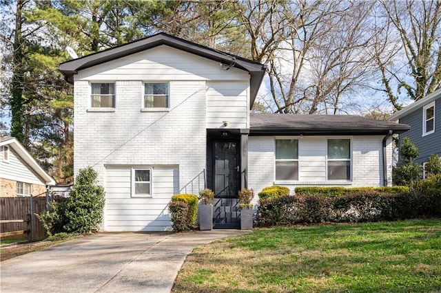 view of front of home with a front lawn