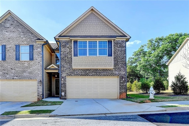 4421 Fulson Dr, Lilburn, GA 30047 - view of front of property featuring a garage, driveway, and brick siding