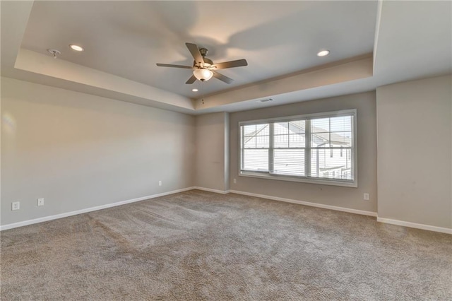 4421 Fulson Dr, Lilburn, GA 30047 - carpeted spare room with a raised ceiling, a ceiling fan, baseboards, recessed lighting, and fire sprinkler in ceiling