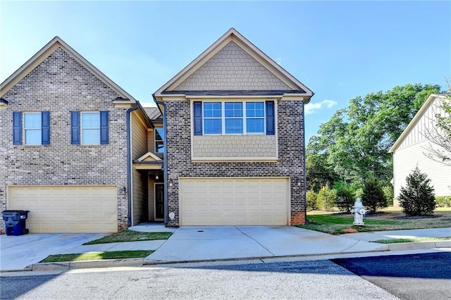 4421 Fulson Dr, Lilburn, GA 30047 - view of front of home featuring an attached garage, concrete driveway, and brick siding