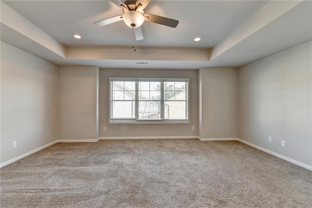 4421 Fulson Dr, Lilburn, GA 30047 - carpeted spare room with a raised ceiling, baseboards, a ceiling fan, and recessed lighting