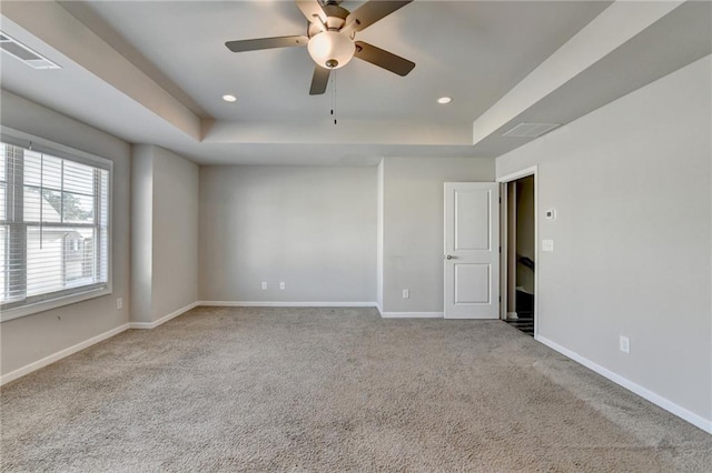 4421 Fulson Dr, Lilburn, GA 30047 - spare room with a tray ceiling, carpet floors, ceiling fan, baseboards, and recessed lighting