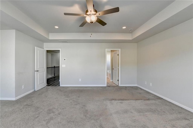 4421 Fulson Dr, Lilburn, GA 30047 - unfurnished bedroom featuring baseboards, a raised ceiling, carpet floors, recessed lighting, and ensuite bathroom