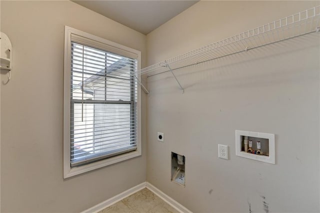 4421 Fulson Dr, Lilburn, GA 30047 - laundry room featuring electric dryer hookup, hookup for a washing machine, baseboards, and healthy amount of natural light
