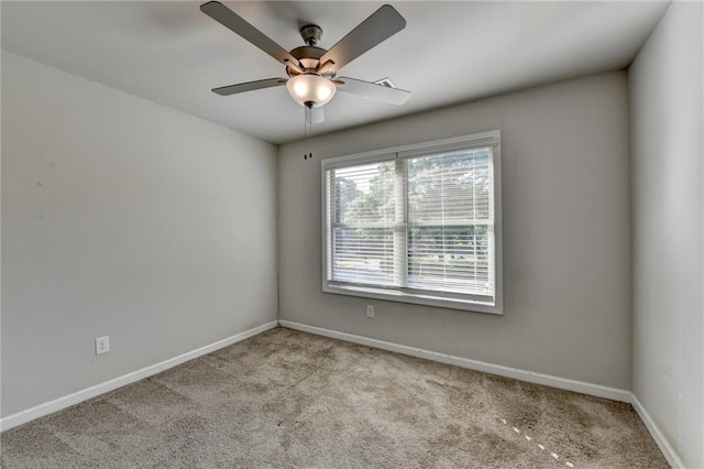 4421 Fulson Dr, Lilburn, GA 30047 - carpeted spare room with baseboards and a ceiling fan