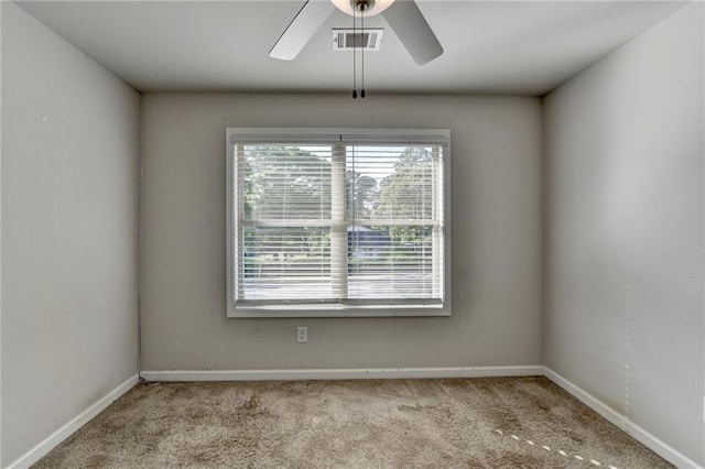 4421 Fulson Dr, Lilburn, GA 30047 - carpeted spare room with ceiling fan and baseboards