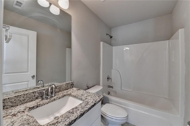 4421 Fulson Dr, Lilburn, GA 30047 - bathroom with toilet, vanity, and tub / shower combination