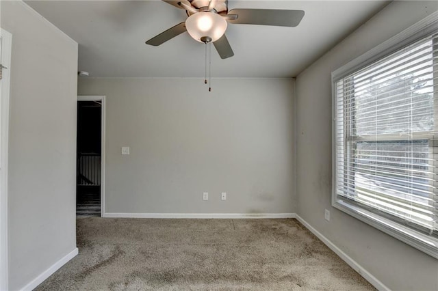 4421 Fulson Dr, Lilburn, GA 30047 - empty room with carpet, ceiling fan, and baseboards