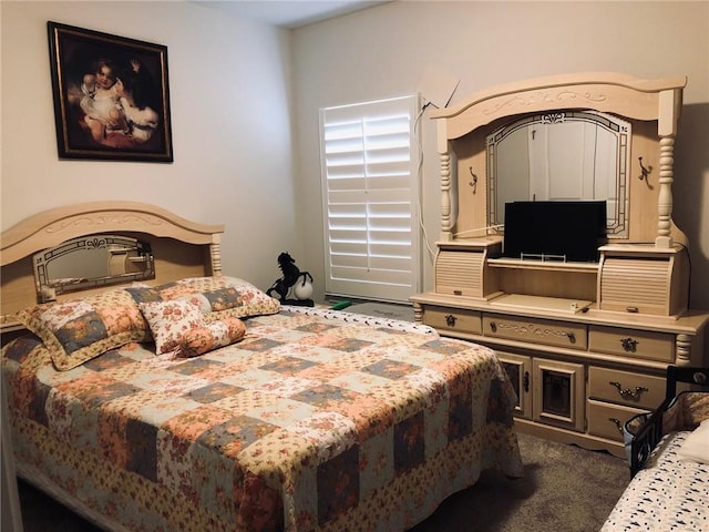 bedroom featuring carpet