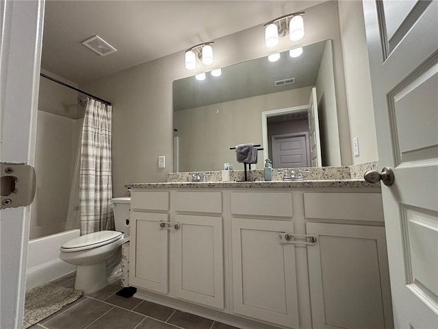 full bathroom with tile patterned floors, visible vents, toilet, and vanity