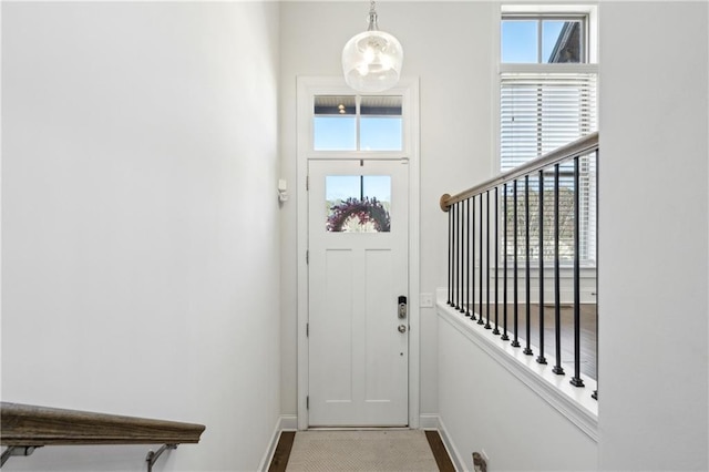 doorway to outside featuring plenty of natural light