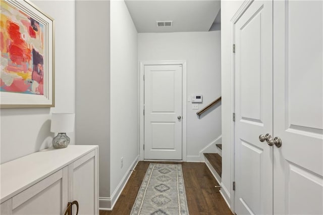 hall featuring dark hardwood / wood-style floors