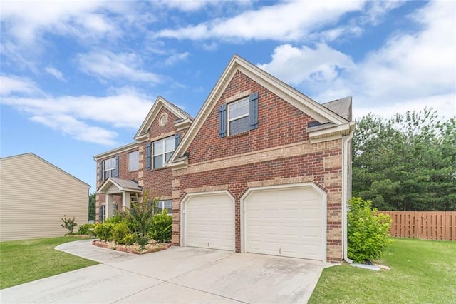 traditional home featuring brick siding, concrete driveway, and an attached garage