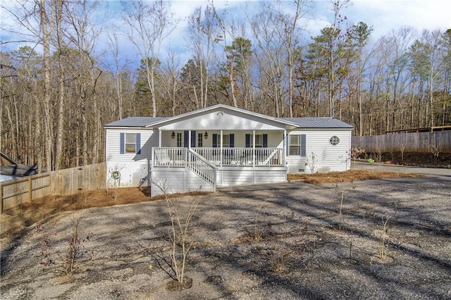 view of front of home featuring covered porch