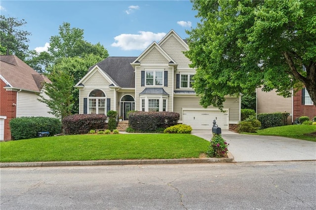 310 Arbor Creek Trl, Roswell, GA 30076 - view of front of property featuring driveway, a front lawn, and a garage