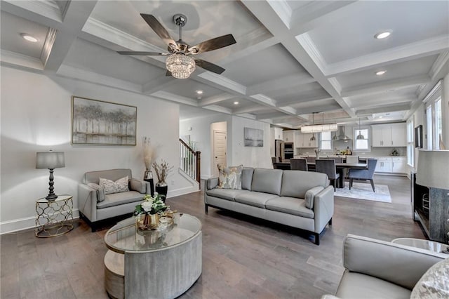 8305 Beryl Overlook, Gainesville, GA 30506 - living room featuring stairway, coffered ceiling, beam ceiling, baseboards, and wood finished floors
