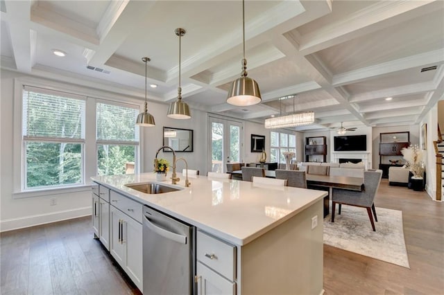 8305 Beryl Overlook, Gainesville, GA 30506 - kitchen with stainless steel dishwasher, a sink, coffered ceiling, dark wood finished floors, and pendant lighting