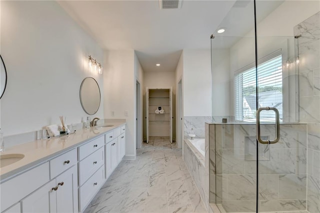 8305 Beryl Overlook, Gainesville, GA 30506 - full bath with marble finish flooring, double vanity, a bath, a stall shower, and recessed lighting