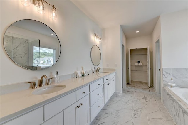 8305 Beryl Overlook, Gainesville, GA 30506 - full bathroom featuring marble look tiles, double vanity, a garden tub, recessed lighting, and a marble finish shower