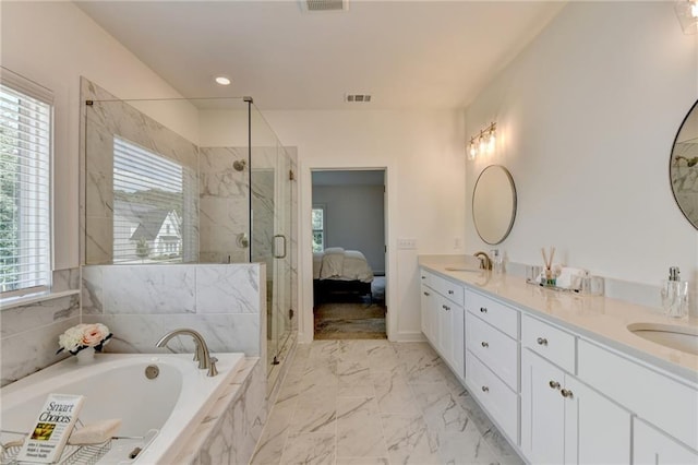 8305 Beryl Overlook, Gainesville, GA 30506 - ensuite bathroom featuring double vanity, a garden tub, healthy amount of natural light, and a marble finish shower