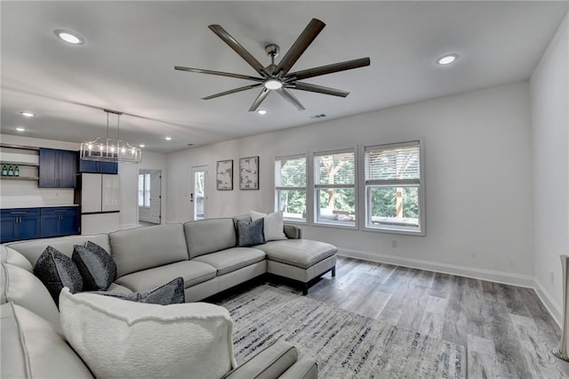 8305 Beryl Overlook, Gainesville, GA 30506 - living room with healthy amount of natural light, ceiling fan, light wood-type flooring, recessed lighting, and baseboards