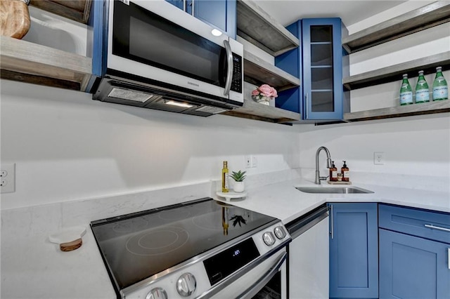8305 Beryl Overlook, Gainesville, GA 30506 - kitchen with open shelves, electric stove, blue cabinets, a sink, and dishwasher