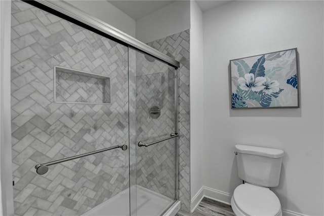 8305 Beryl Overlook, Gainesville, GA 30506 - full bathroom featuring toilet, baseboards, and a tile shower