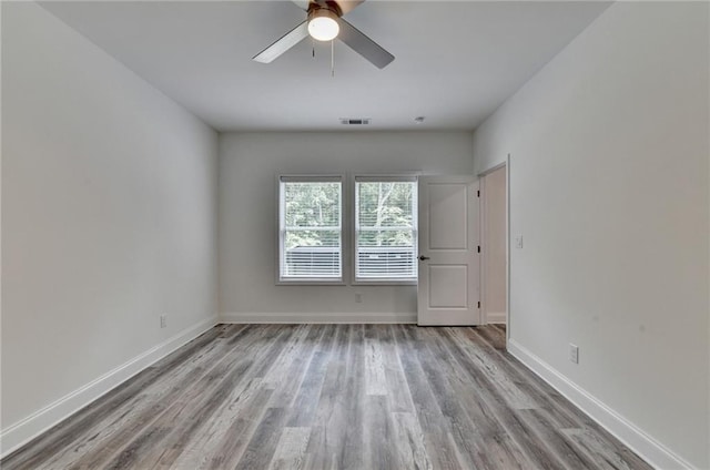 8305 Beryl Overlook, Gainesville, GA 30506 - unfurnished room with wood finished floors, ceiling fan, and baseboards