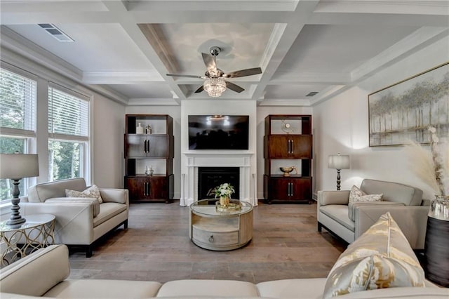 8305 Beryl Overlook, Gainesville, GA 30506 - living room with wood finished floors, ceiling fan, a fireplace, beam ceiling, and coffered ceiling