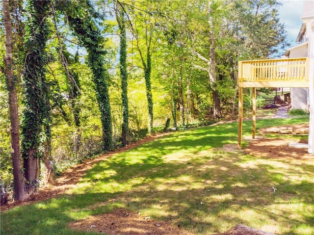 view of yard with a deck