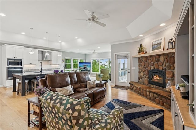 1832 Monument Rd, Jasper, GA 30143 - living room featuring ceiling fan, light wood-style floors, ornamental molding, a fireplace, and recessed lighting