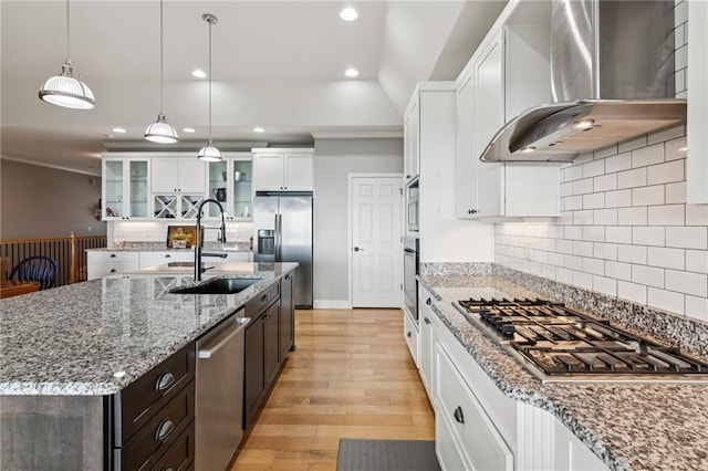 1832 Monument Rd, Jasper, GA 30143 - kitchen featuring appliances with stainless steel finishes, wall chimney range hood, crown molding, recessed lighting, and light wood-type flooring