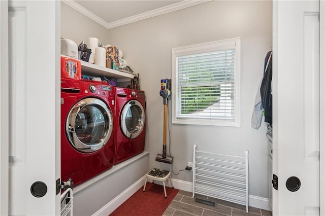 1832 Monument Rd, Jasper, GA 30143 - laundry room with washing machine and clothes dryer, ornamental molding, and wood finished floors
