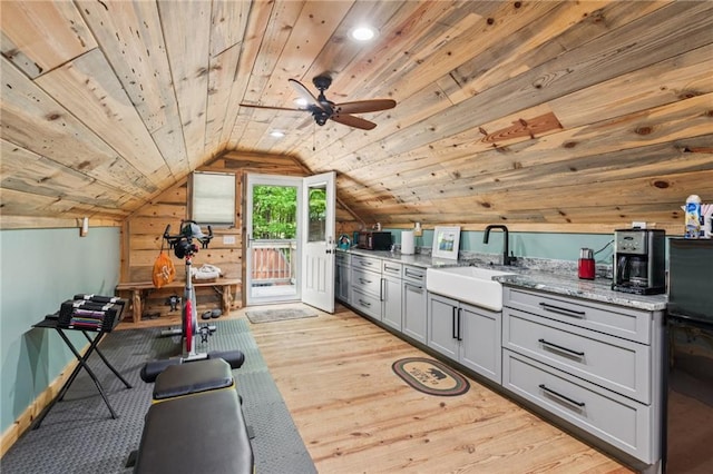 1832 Monument Rd, Jasper, GA 30143 - exercise room with light wood-style flooring, a ceiling fan, vaulted ceiling, wooden ceiling, and wood walls