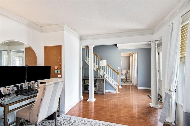 10 Callaway Ct, Hiram, GA 30141 - home office featuring crown molding, decorative columns, and wood finished floors
