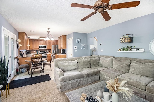 10 Callaway Ct, Hiram, GA 30141 - living area with a ceiling fan, a textured ceiling, light tile patterned floors, and light carpet