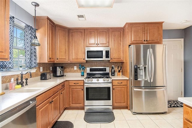 10 Callaway Ct, Hiram, GA 30141 - kitchen featuring light countertops, appliances with stainless steel finishes, decorative backsplash, and a sink