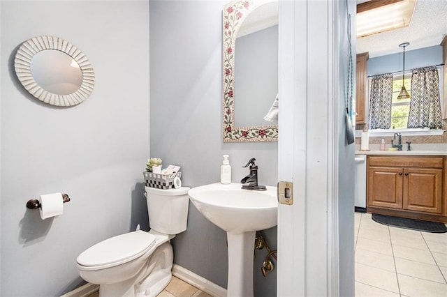 10 Callaway Ct, Hiram, GA 30141 - bathroom featuring a sink, tile patterned floors, baseboards, and toilet