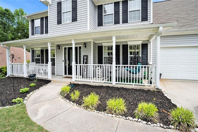 10 Callaway Ct, Hiram, GA 30141 - view of front of home featuring covered porch, an attached garage, and driveway