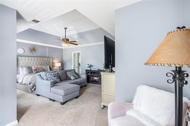 10 Callaway Ct, Hiram, GA 30141 - bedroom with visible vents, lofted ceiling, a fireplace, a ceiling fan, and carpet