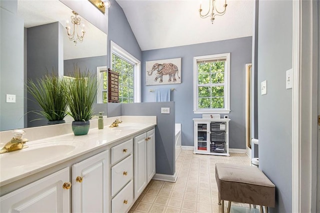 10 Callaway Ct, Hiram, GA 30141 - bathroom with an inviting chandelier, a wealth of natural light, a sink, and lofted ceiling