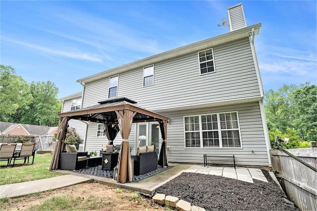 10 Callaway Ct, Hiram, GA 30141 - back of property featuring a chimney, a gazebo, an outdoor hangout area, a fenced backyard, and a patio