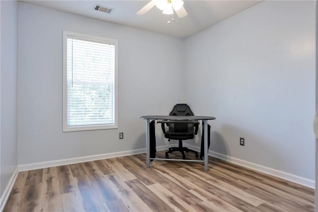 151 River Park Cir, Mcdonough, GA 30252 - unfurnished office with wood finished floors, ceiling fan, and healthy amount of natural light