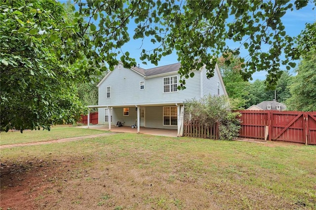 151 River Park Cir, Mcdonough, GA 30252 - rear view of house with a patio area and a gate