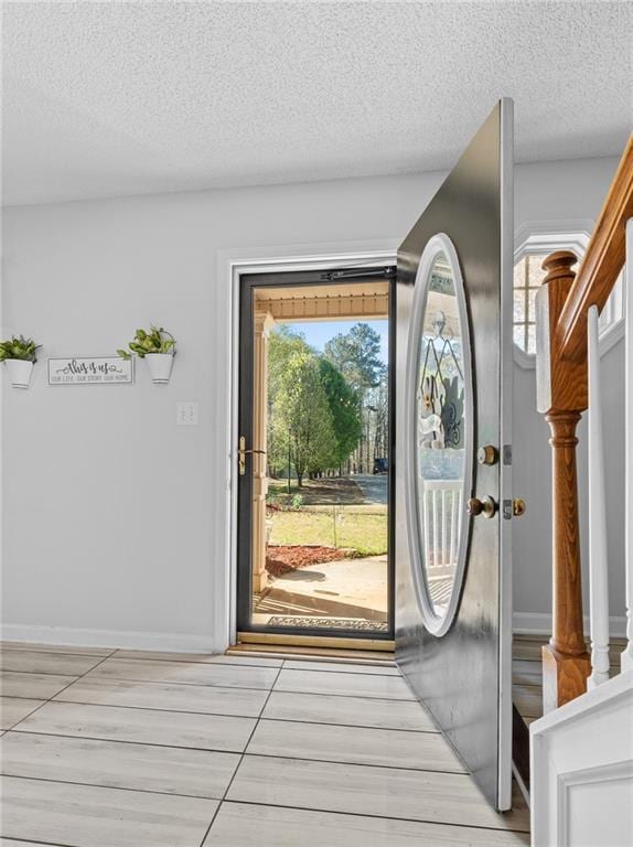 151 River Park Cir, Mcdonough, GA 30252 - entrance foyer featuring a textured ceiling