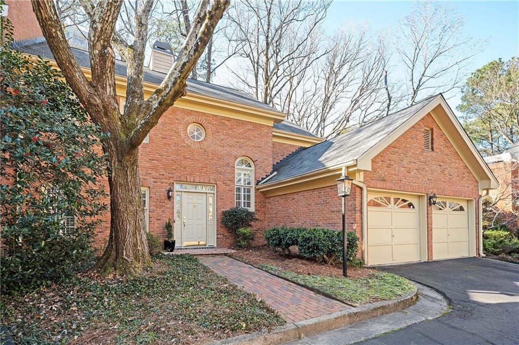 front of property featuring a garage