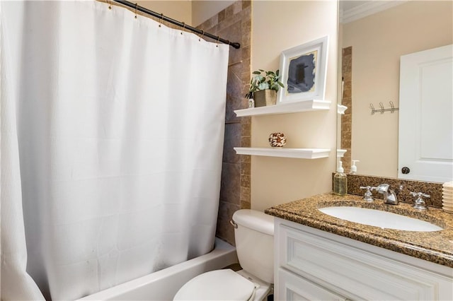 full bathroom with shower / tub combo with curtain, vanity, ornamental molding, and toilet